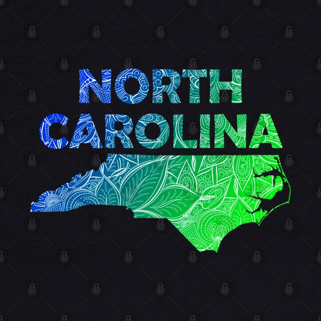 Colorful mandala art map of North Carolina with text in blue and green by Happy Citizen